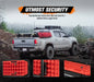 Gray pickup truck with Bunker Indust Recovery Tracks Mounting Kit and red traction board