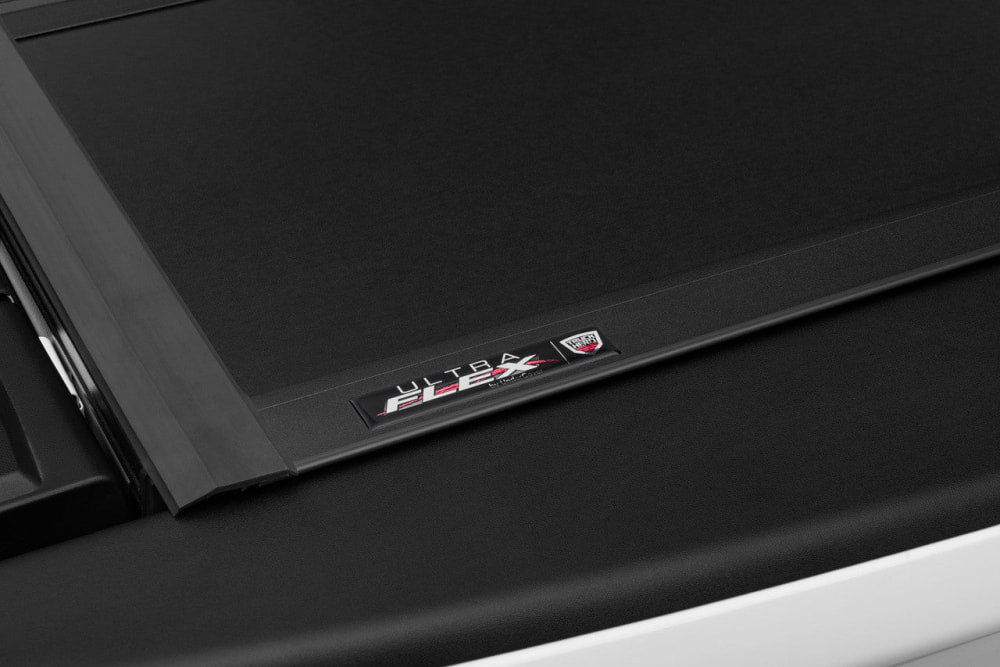 UnderCover Ultra Flex Hard Folding Truck Bed Tonneau Cover for RAM / Silverado / Ford / LDV - Tonneau